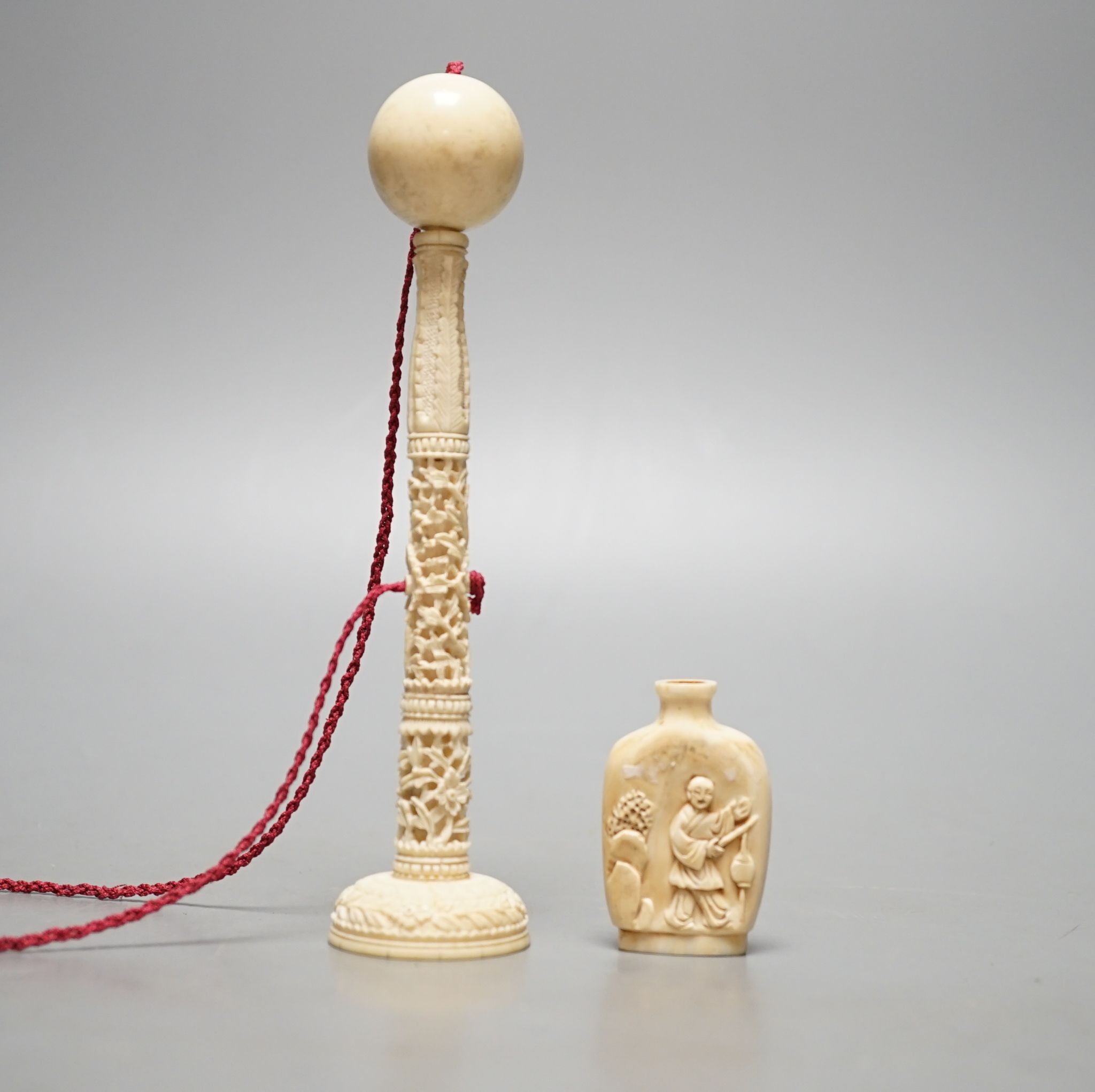 A Chinese export ivory spike and ball game, 16.5cm, and an ivory snuff bottle